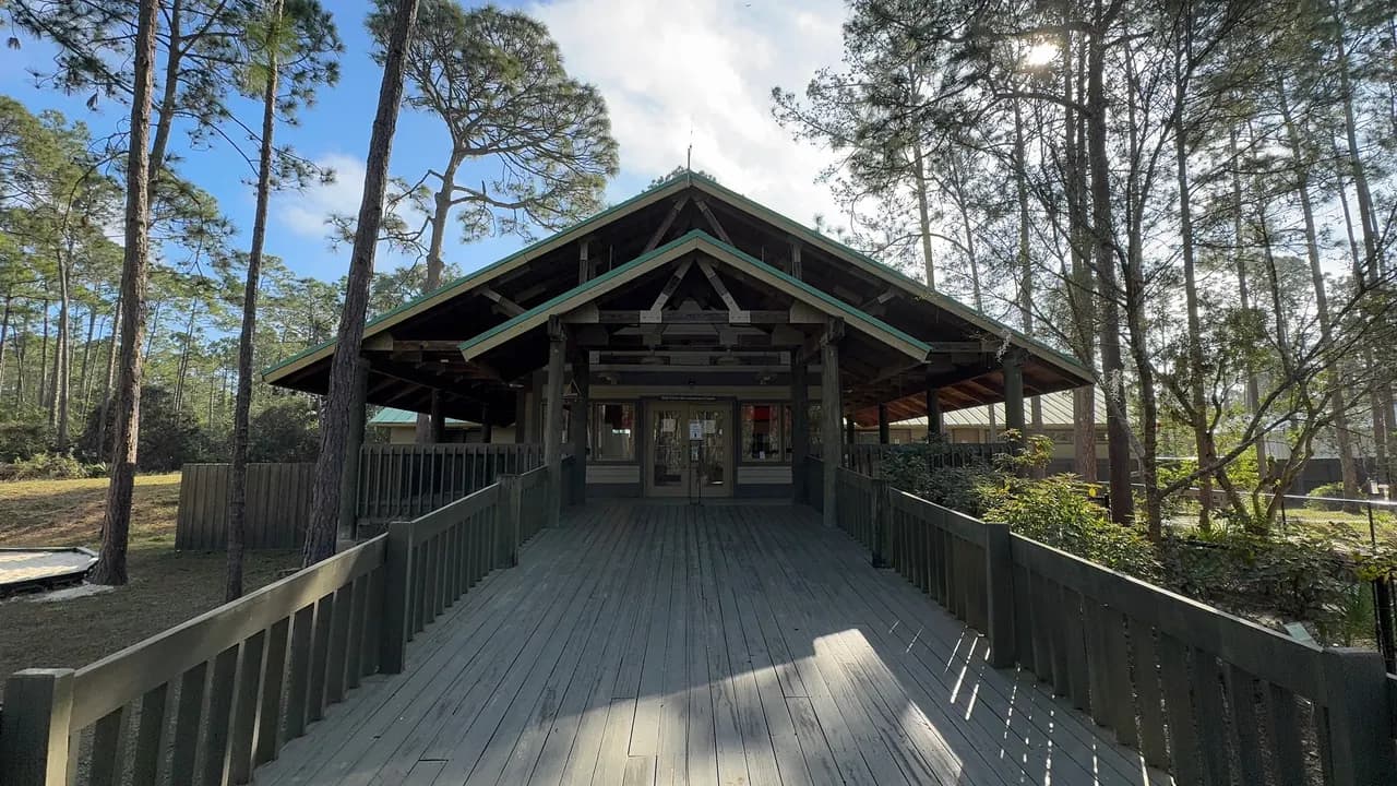 A shaded boardwalk leading to the Tibet-Butler Preserve visitor building